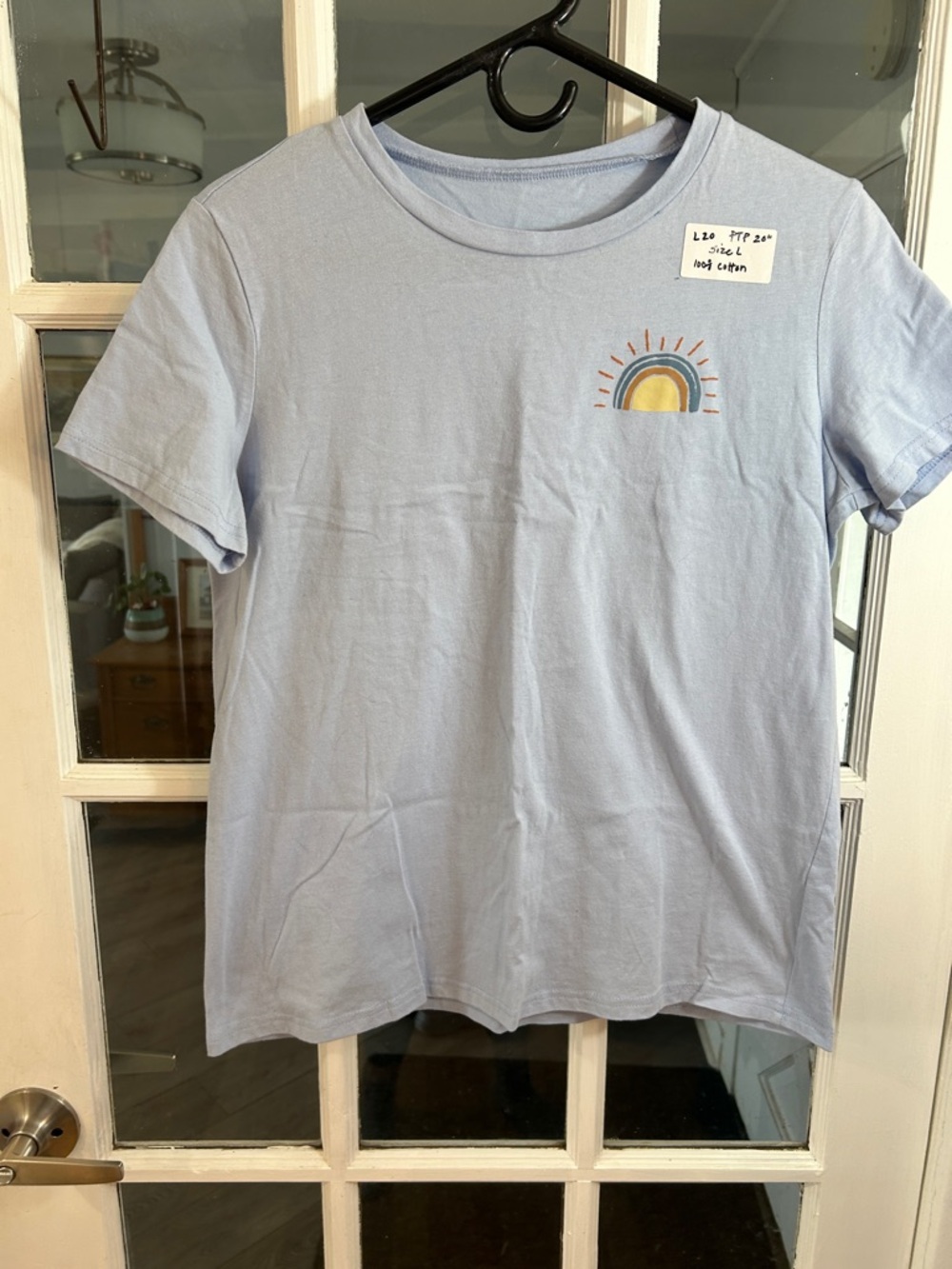 L20.   Light Blue Graphic Tee with Rainbow Sun